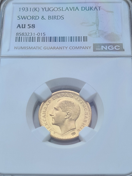 картинка Югославия. 1 Дукат 1931 г. Золото. 3.49 г*0.986 0.1106 oz. СЛАБ NGC AU 58! от магазина Одежда+ 3