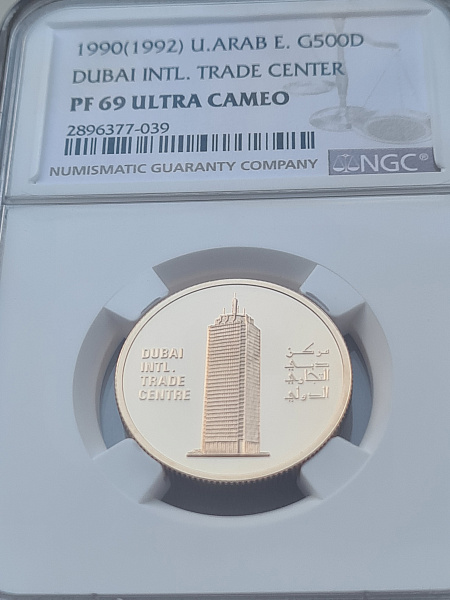 картинка ОАЭ. 500 Дирхамов 1990 г. Золото. 19.97 г*0.917 0.5887 oz. СЛАБ NGC PF 69 ULTRA CAMEO! от магазина Одежда+ 3